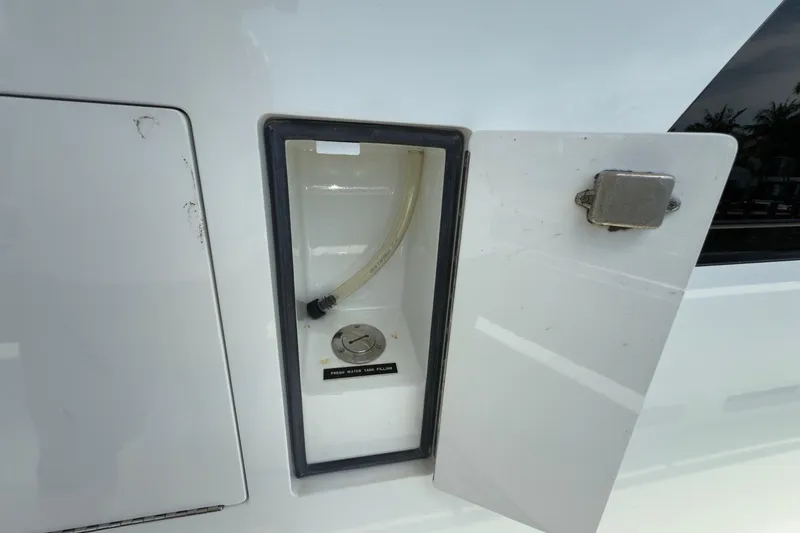 Family Time Yacht Photos Pics Fresh water tank filling compartment on 2006 Cheoy Lee 84 Bravo yacht.