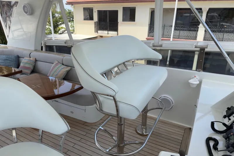 Family Time Yacht Photos Pics Luxury seating on 2006 Cheoy Lee 84 Bravo yacht with elegant interior design.