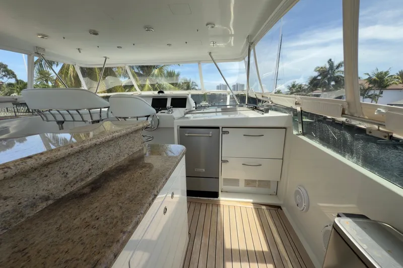 Family Time Yacht Photos Pics Luxurious 2006 Cheoy Lee 84 Bravo yacht interior with modern helm and sleek design.