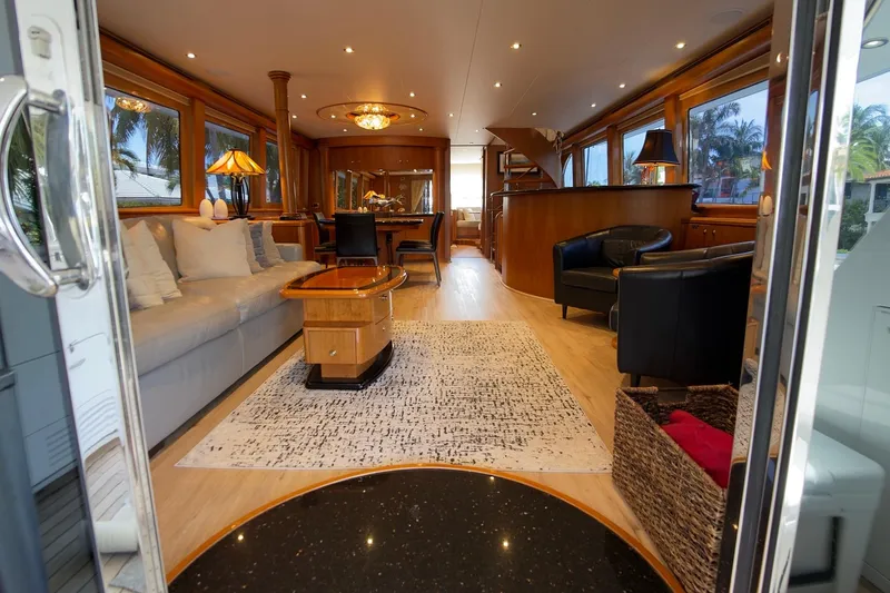 Family Time Yacht Photos Pics Luxurious interior of 2006 Cheoy Lee 84 Bravo yacht with elegant furnishings and decor.