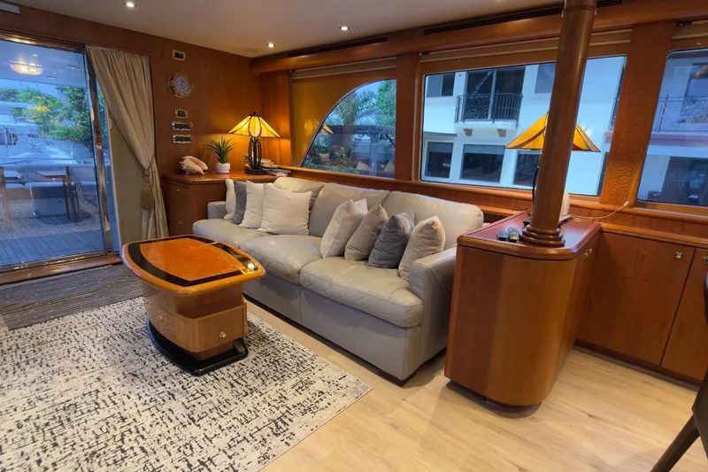 Family Time Yacht Photos Pics Luxurious interior of 2006 Cheoy Lee 84 Bravo yacht with elegant furnishings and decor.