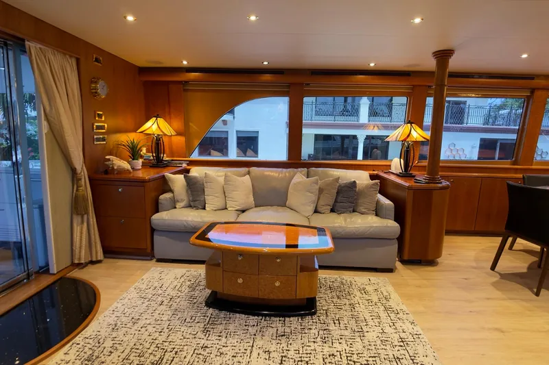 Family Time Yacht Photos Pics Luxurious interior of 2006 Cheoy Lee 84 Bravo yacht with elegant furnishings and decor.