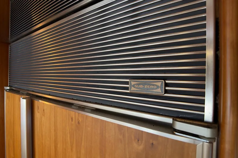 Family Time Yacht Photos Pics Sub-Zero refrigerator detail on 2006 Cheoy Lee 84 Bravo yacht.