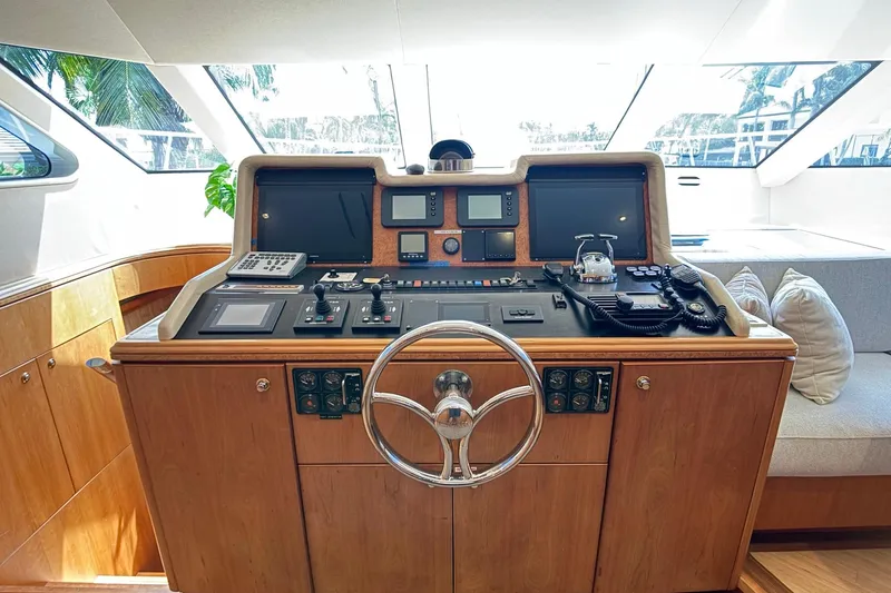 Family Time Yacht Photos Pics Helm station of 2006 Cheoy Lee 84 Bravo yacht with modern navigation equipment.