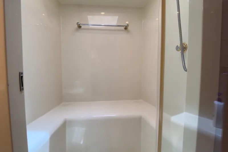 Family Time Yacht Photos Pics Luxurious shower area in 2006 Cheoy Lee 84 Bravo yacht bathroom.