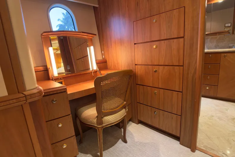 Family Time Yacht Photos Pics Luxurious wooden vanity area on 2006 Cheoy Lee 84 Bravo yacht interior.