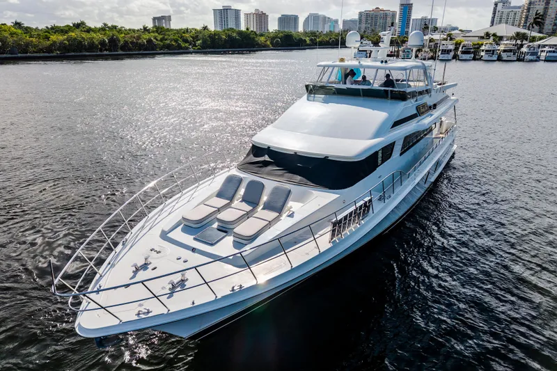 Family Time Yacht Photos Pics Luxury 2006 Cheoy Lee 84 Bravo yacht cruising on a sunny day.