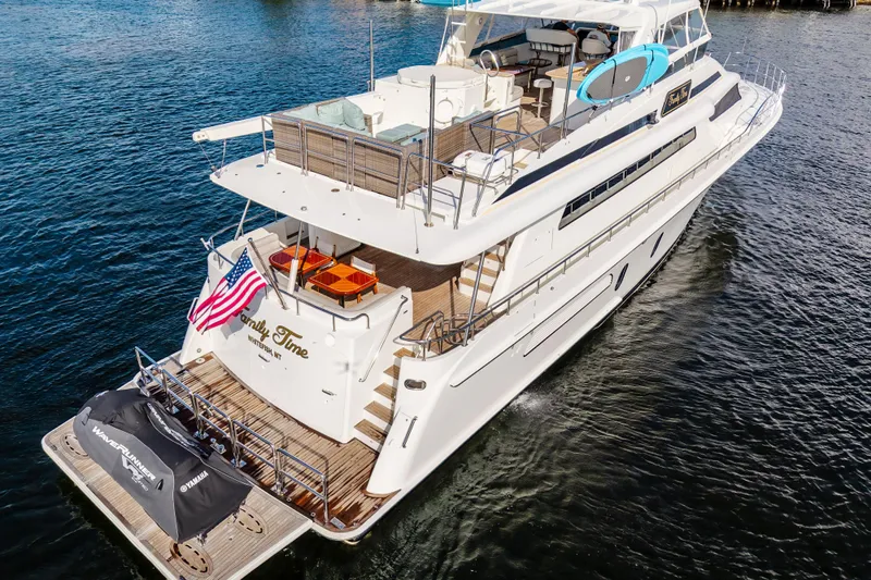 Family Time Yacht Photos Pics Luxurious 2006 Cheoy Lee 84 Bravo yacht cruising on open water.