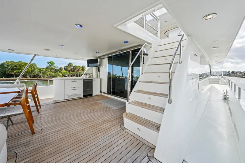 Family Time Yacht Photos Pics Luxurious 2006 Cheoy Lee 84 Bravo yacht deck with elegant seating and modern amenities.