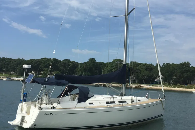 Valanta Yacht Photos Pics 2007 Hanse 400 sailboat docked in a serene marina setting.