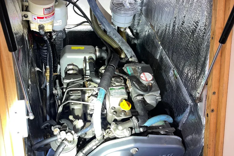 Valanta Yacht Photos Pics Engine compartment of a 2007 Hanse 400 sailboat, showcasing mechanical components and insulation.