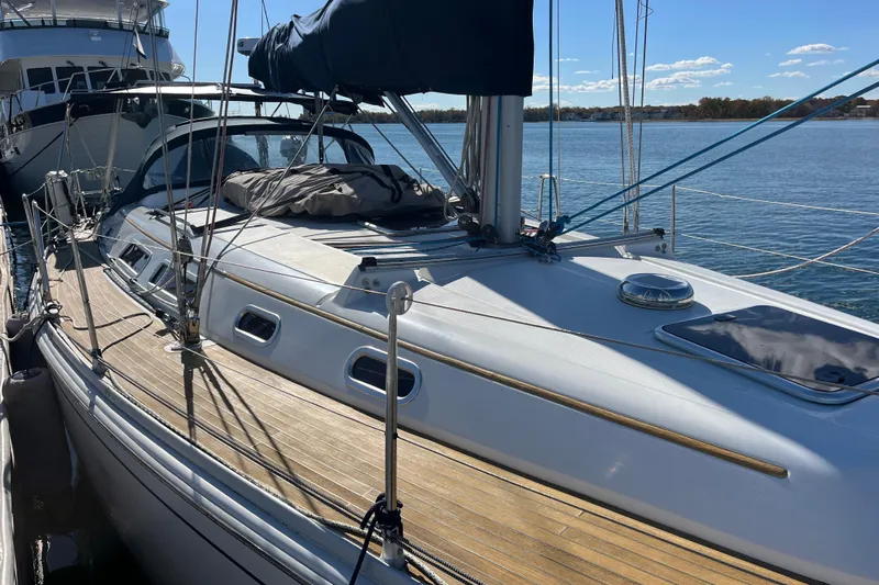 Valanta Yacht Photos Pics 2007 Hanse 400 sailboat docked, featuring sleek design and wooden deck.