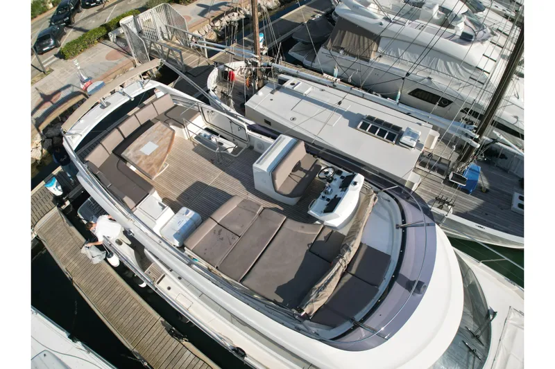 Yacht Photos Pics Aerial view of 2017 Prestige 560 Fly yacht docked at marina.