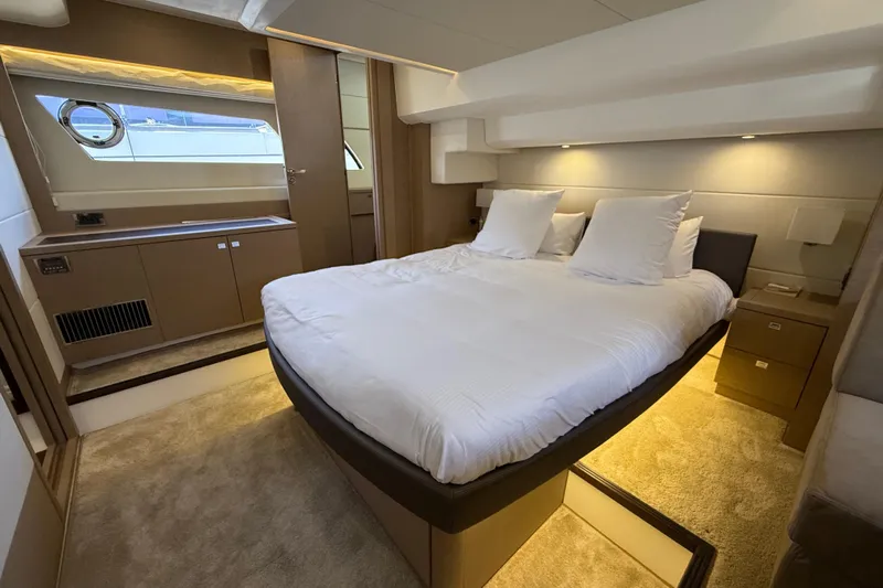  Yacht Photos Pics Luxurious bedroom interior of 2017 Prestige 560 Fly yacht with modern design.