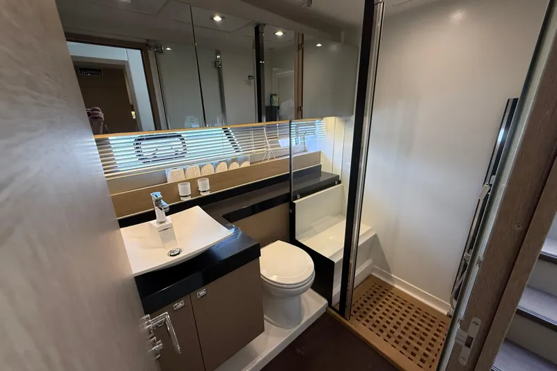  Yacht Photos Pics Luxurious bathroom in 2017 Prestige 560 Fly yacht with modern fixtures and elegant design.