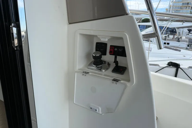 Yacht Photos Pics Control panel on a 2017 Prestige 560 Fly yacht, featuring joystick and switches.