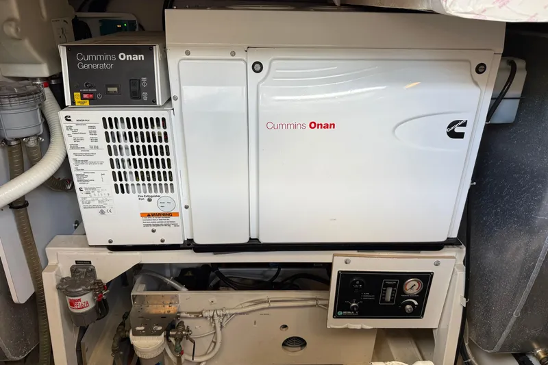  Yacht Photos Pics Cummins Onan generator in 2017 Prestige 560 Fly yacht engine room.