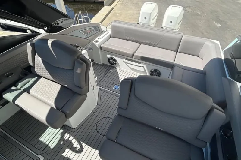 Pieseas Yacht Photos Pics 2019 Cruisers Yachts 338 Outboard interior with gray seating and modern design.