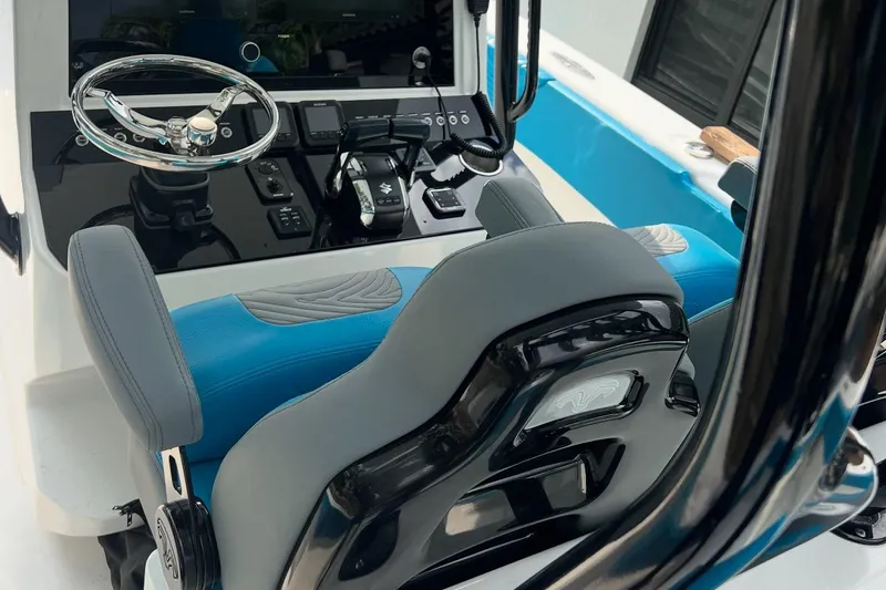  Yacht Photos Pics 2023 Sea Tech 33 CC boat cockpit with modern steering and controls.