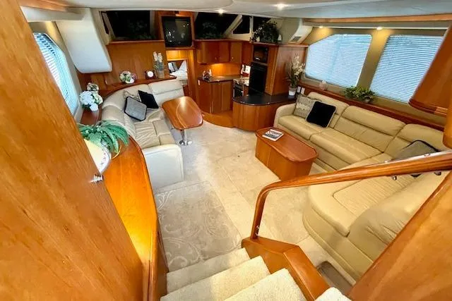 "sunseeker" Yacht Photos Pics Luxurious interior of 2002 Silverton 43 Motor Yacht with elegant seating and wood finishes.