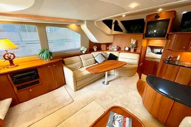 "sunseeker" Yacht Photos Pics Luxurious interior of a 2002 Silverton 43 Motor Yacht with elegant furnishings and decor.