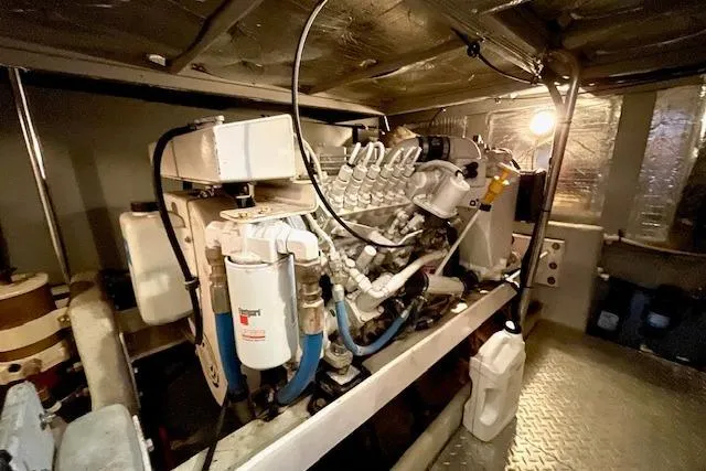 "sunseeker" Yacht Photos Pics Engine room of 2002 Silverton 43 Motor Yacht, showcasing mechanical components and systems.