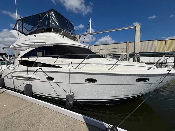 Compass Rose Yacht Photos Pics 2006 Meridian 341 Sedan yacht docked at marina under clear blue sky.