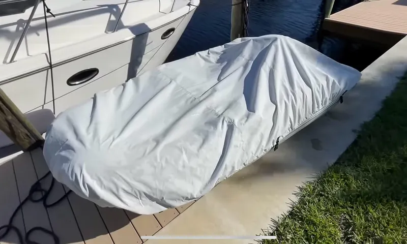 Compass Rose Yacht Photos Pics Covered boat on dock beside 2006 Meridian 341 Sedan yacht.