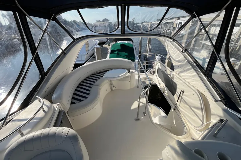 Compass Rose Yacht Photos Pics 2006 Meridian 341 Sedan yacht interior with elegant seating and panoramic windows.