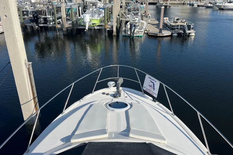 Compass Rose Yacht Photos Pics Bow view of 2006 Meridian 341 Sedan yacht docked at marina.