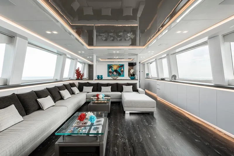 Sands Yacht Photos Pics Luxurious interior of 2018 Maiora 36 yacht with modern decor and panoramic windows.
