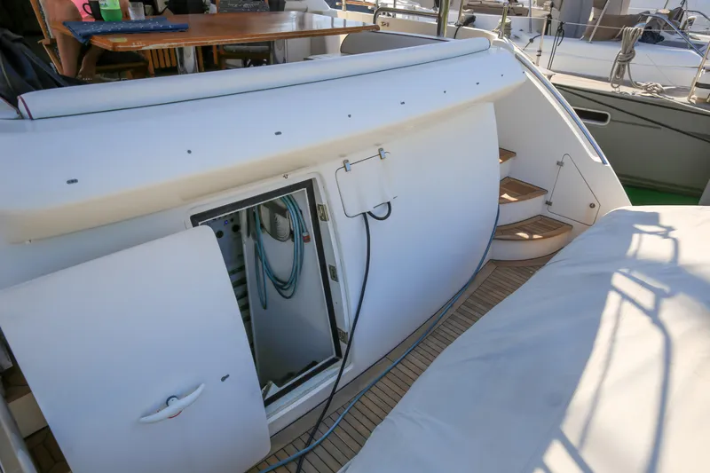  Yacht Photos Pics Azimut Fly 78 yacht, 2010 model, showing open hatch and wooden steps on deck.