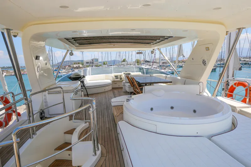  Yacht Photos Pics Luxurious Azimut Fly 78 yacht deck with jacuzzi, seating, and ocean view, 2010 model.