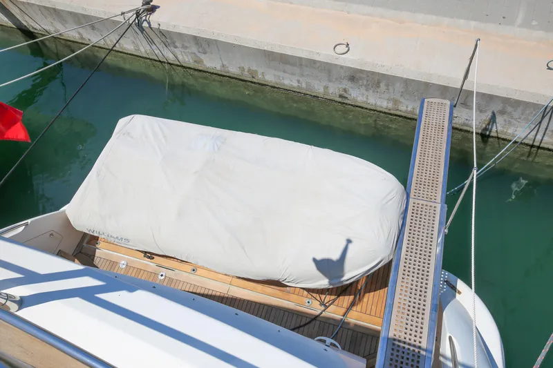  Yacht Photos Pics Azimut Fly 78 yacht, 2010 model, docked with covered deck area.