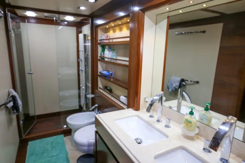  Yacht Photos Pics Luxurious bathroom interior on 2010 Azimut Fly 78 yacht with double sinks and glass shower.
