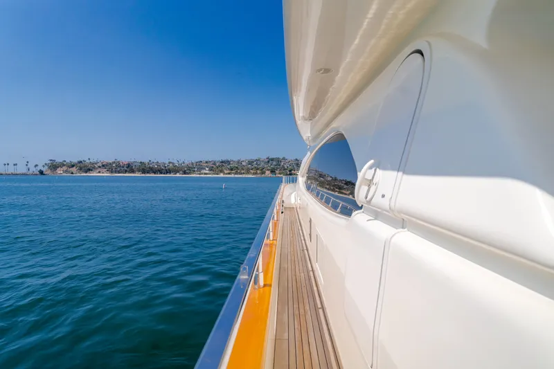 Anejo Yacht Photos Pics Side view of 2005 Azimut 85 Ultimate yacht on calm blue sea.