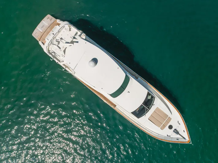 Anejo Yacht Photos Pics Aerial view of 2005 Azimut 85 Ultimate yacht on clear blue water.