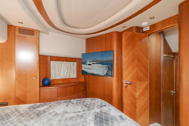 Anejo Yacht Photos Pics Luxurious 2005 Azimut 85 Ultimate yacht interior with wood paneling and modern decor.