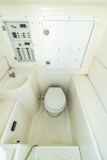  Yacht Photos Pics Interior of a 2016 SeaVee 390Z with toilet and control panel.