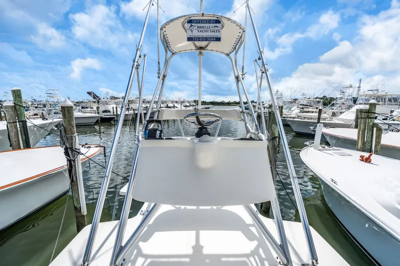  Yacht Photos Pics 2016 SeaVee 390Z boat docked at marina, blue sky.