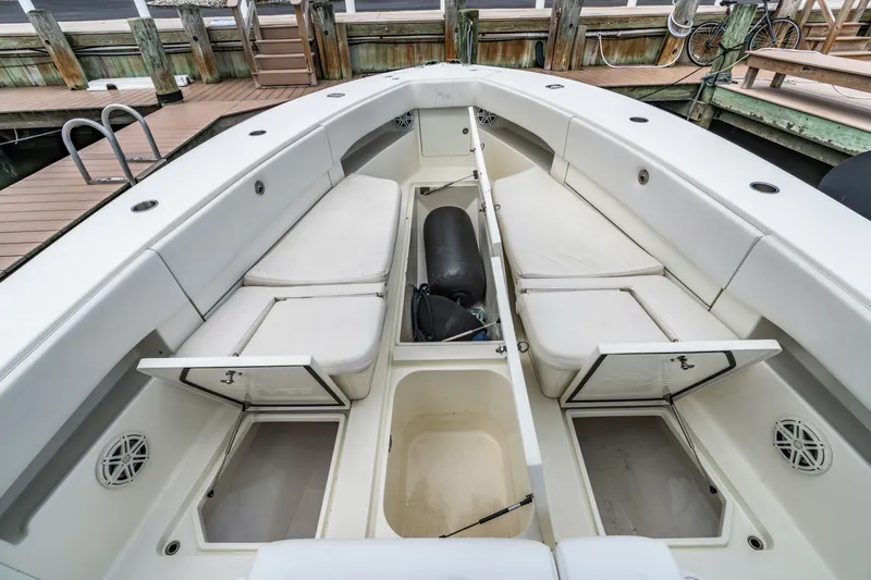  Yacht Photos Pics Interior view of a 2016 SeaVee 390Z boat with storage compartments.