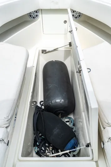  Yacht Photos Pics Storage compartment in SeaVee 390Z boat with fender and ropes.
