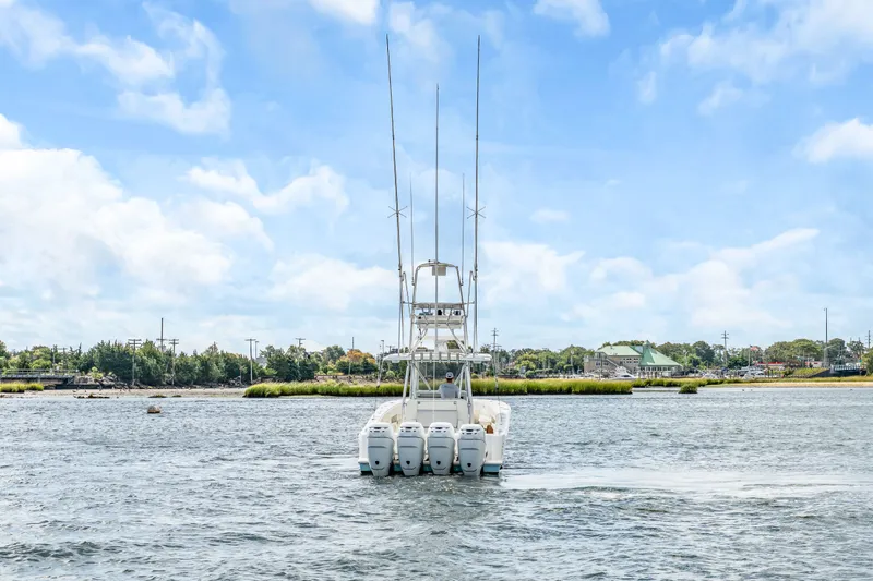  Yacht Photos Pics 2016 SeaVee 390Z boat with four outboard engines on the water.