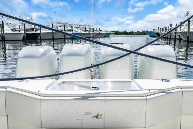  Yacht Photos Pics 2016 SeaVee 390Z boat with four outboard engines in harbor.