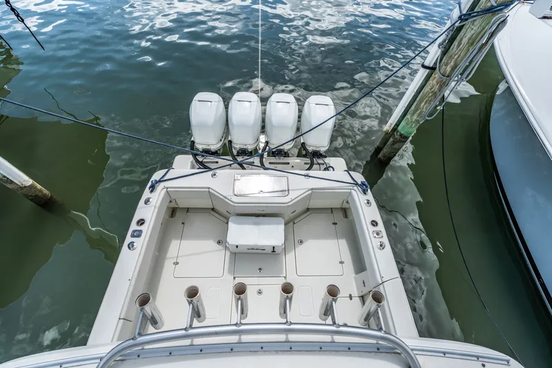  Yacht Photos Pics Rear view of a 2016 SeaVee 390Z boat with four outboard engines.