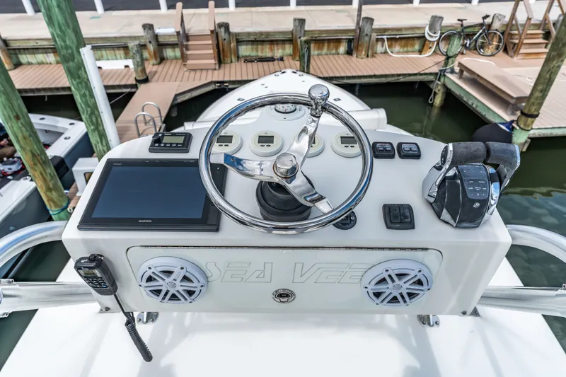  Yacht Photos Pics Helm console of a 2016 SeaVee 390Z boat at the dock.