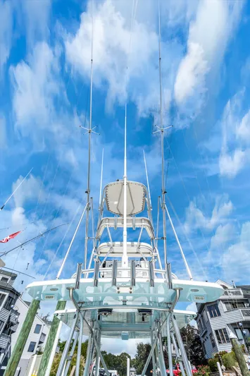  Yacht Photos Pics 2016 SeaVee 390Z boat against blue sky and clouds.