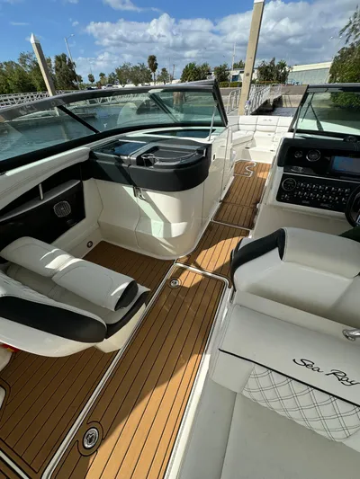  Yacht Photos Pics 2015 Sea Ray 350 SLX boat interior with luxurious seating and modern dashboard.