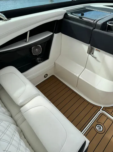  Yacht Photos Pics 2015 Sea Ray 350 SLX interior with white seating and teak flooring.