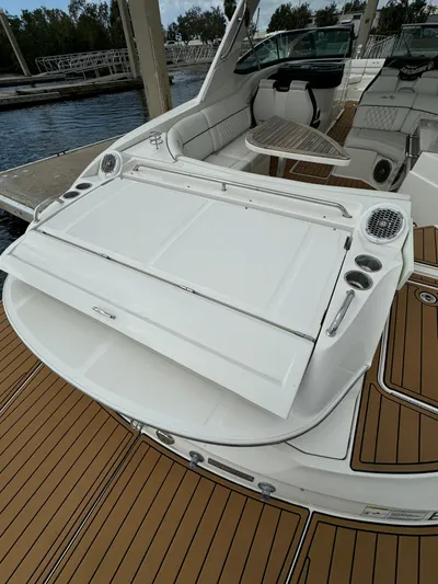  Yacht Photos Pics 2015 Sea Ray 350 SLX boat with spacious deck and seating area.